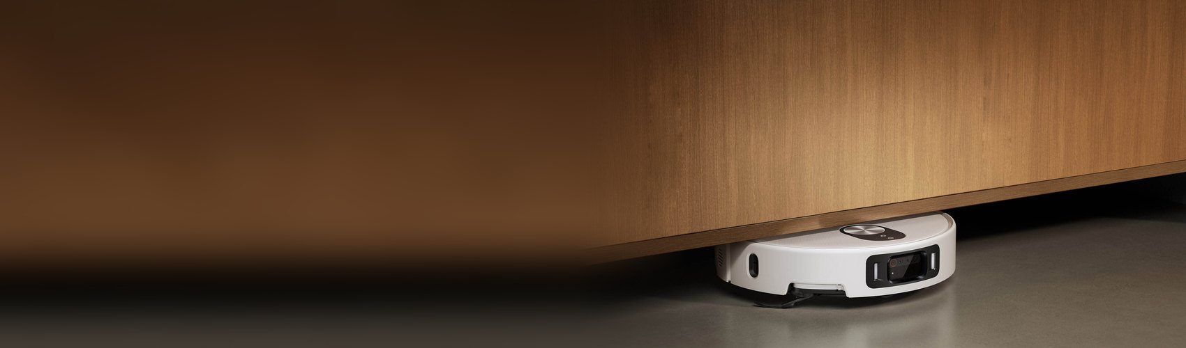 Xiaomi Robot Vacuum 5 Pro cleaning under a cabinet